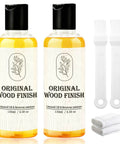 Premium Linseed Oil And Beeswax Wood Finish Sets Fast For A Killer Protective Seal containing two 130ml bottles with applicators and cloths.