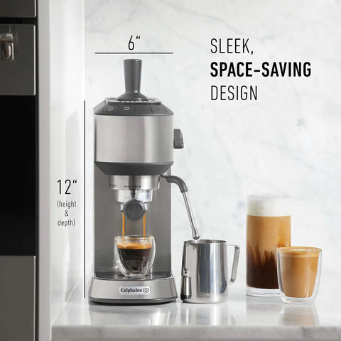 Compact Stainless Steel Espresso Maker With Built In Milk Frother Shoots Pro Level Lattes And Cappuccinos Daily Ultra Sleek Countertop Coffee Brewer Slays Your Cafe Routine Bang For The Buck standing on counter with espresso pouring.