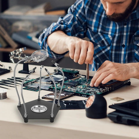 Adjustable Soldering Station Helping Hand With Flexible Arms And PCB Holder for electronics repair and welding tasks in use