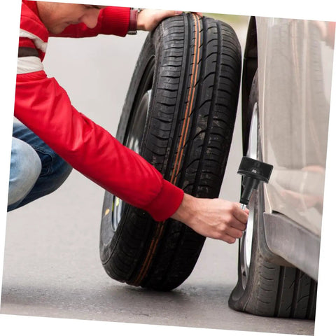 Person installing Spare Tire Hold Down Bolt For Cars And Trucks Easy Install Durable Wheel Retention Accessory on a tire
