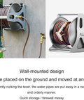 No Fuss Stainless Steel Garden Hose Reel Slick Wall Mounted Retracting Cart With 30 Foot Hose on wall with lever and sprayer.