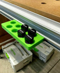 Premium Bench Dog Storage Rack For Festool Mft Three Table Side Mount Holder in green with eight 20Mm and three quarter inch dog pins.