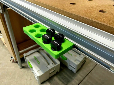 Premium Bench Dog Storage Rack For Festool Mft Three Table Side Mount Holder in green with eight 20Mm and three quarter inch dog pins.