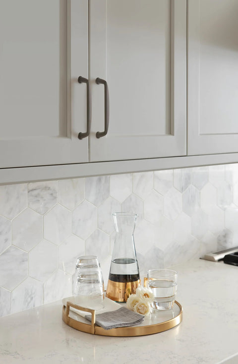 Kitchen with Kane Black Bronze Cabinet Pull Transitional Style Drawer Handle for Cabinets and Furniture installed on gray cabinets.