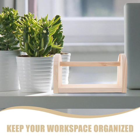 Solid Wood Tape Dispenser With Razor Sharp Blade Keep Your Craft And Packing Tape Setup Sick And Tidy Clean Desk Organization For Home Office Or Kitchen Counter Vibes on a desk with plants.