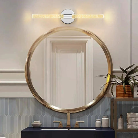 Gold Bubble Crystal Wall Sconce With LED Vanity Light over large round mirror in bathroom, brass finish, cozy glow