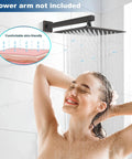 Woman enjoying 12 Inch Rain Shower Head Large Square Waterfall Showerhead With High Pressure Stainless Steel Finish Ceiling Or Wall Mount Oil Rubbed Bronze Top Notch Spa Like Full Body Coverage