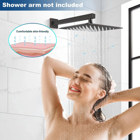 Woman enjoying 12 Inch Rain Shower Head Large Square Waterfall Showerhead With High Pressure Stainless Steel Finish Ceiling Or Wall Mount Oil Rubbed Bronze Top Notch Spa Like Full Body Coverage