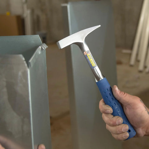 Person using 12 Oz Tinner's Cross Peen Hammer for Sheet Metalwork, USA Made with forged steel and shock reduction grip.