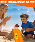 Family playing with Flexible Roll Up Race Track for Kids Outdoor Toys Portable DIY Race Car Track on the beach.