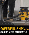 Hardworking StealthSonic Wet Dry Shop Vac Six Gallon Five HP Ultra Quiet Vacuum With Beast Mode Suction in use for cleanup.