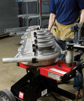 Gardner Bender B2000 Cyclone Electric Conduit Bender For 1/2 To 2 Inch Emt Rigid Al And Imc Pipe, shown in use with pipe.