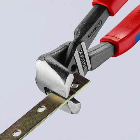 Close-up of high leverage bolt end cutting nippers with multi component design cutting metal wire, showcasing 64 HRC edges.