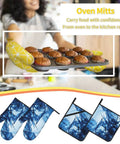 Woman holding a tray of muffins while using Rock Your Kitchen With These Cool Abstract Blue Fluid Shapes Oven Mitts And Pot Holders Set Of 4.