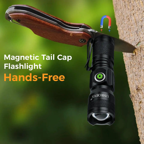 Rechargeable Mini Magnet Flashlight 1200 Lumen Zoomable EDC Light attached magnetically to a tree, demonstrating hands-free use.