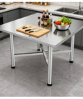 Heavy Duty Foldable Stainless Steel Workbench With Reinforced Crossbeams Thickened Square Countertop used in kitchen for prep.