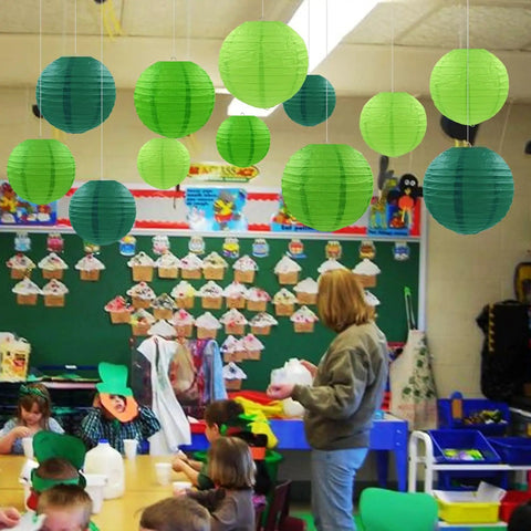 Classroom decorated with 12 Pack Green Party Paper Lanterns Set with 4 size variations in green tones, 6 8 10 12 inch, St. Patrick Day decor.