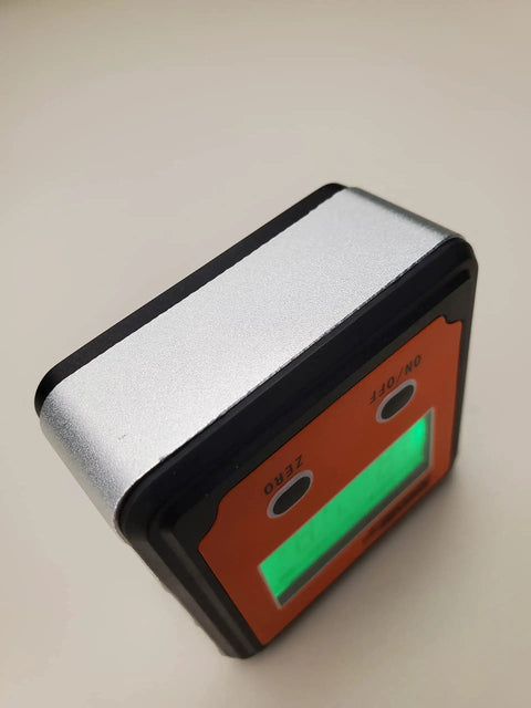 Magnetic Digital Angle Locator With LCD Backlit Display And Two Buttons, 0 To 90 Degrees, Pro Grade Compact Orange Tool close-up view