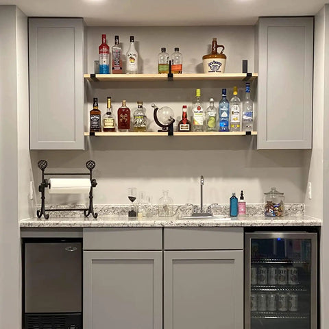 Heavy Duty 12 Inch Wall Shelf Brackets 6 Pack Black Iron For 11.25 Inch Boards Garage Kitchen Laundry Room Floating Shelf Hardware 150 Lbs Per Pair Max supporting kitchen shelves stocked with bottles and glasses above gray cabinets.