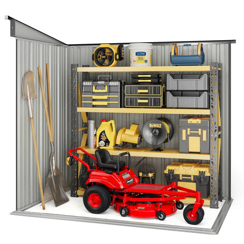 Interior view of Large Capacity 6 Foot By 4 Foot Outdoor Storage Shed With Double Lockable Doors showing garden tools and lawnmower.