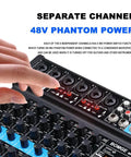 Eight Channel Mini Audio Mixer With MP3 Player showing 48V phantom power section being adjusted