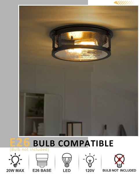 Super Cool Black Flush Mount Ceiling Light With Metal Cage Design And Seeded Glass Shade For That Awesome Industrial Farmhouse Vibe In Your Kitchen Hallway Or Bedroom Twelve Inch Size Needs Two E26 Bulbs, installed in a room setting.