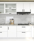 Set Of 10 Matte Black 5 Inch Arch Pulls With Curved Flat Square Design Solid Zinc Alloy Construction installed on white kitchen cabinets