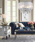 Crystal Pendant Drum Chandelier in Chrome Finish, Four Light LED Ceiling Fixture in living room setting with modern decor