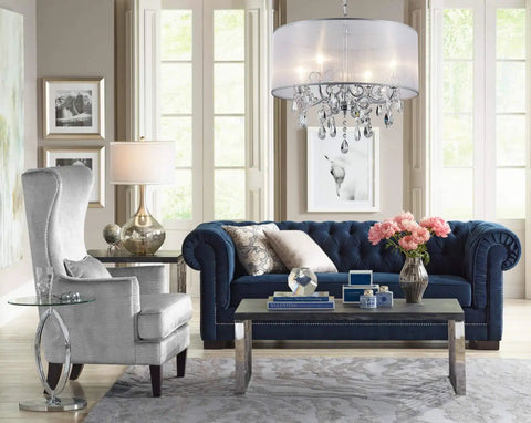 Crystal Pendant Drum Chandelier in Chrome Finish, Four Light LED Ceiling Fixture in living room setting with modern decor
