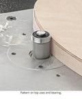 Router bit from Badass Four Piece Router Bit Set with alternating shear geometry cutting a wooden circle on the router table.