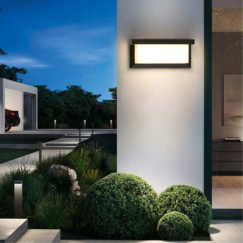 Outdoor Wall Light Modern Exterior Sconce 3000K Warm Waterproof Rectangular Porch Lighting 2 Pack 30W For Patio Garage Front Door Porch Vibes Great For Curb Appeal, mounted on a white wall at night.