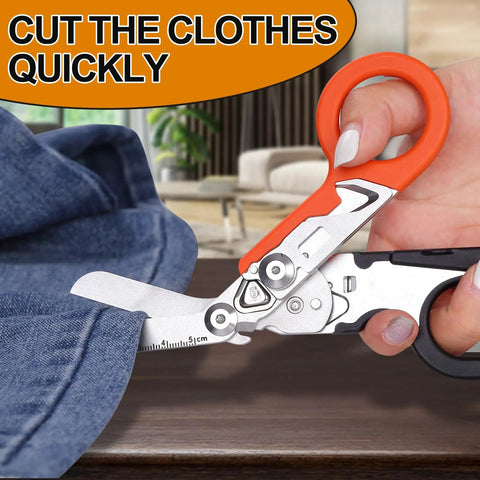 Kickass Tough As Nails 6-In-1 Foldable Trauma Shears cutting denim fabric with ruler for emergency use in hand.