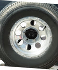 Mounted spare tire with sturdy spare tire hold down bolt with easy install design for car and truck wheel replacement.