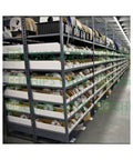 Straight Up Solid Used 11KW Electric Inverter Drive Unit For Industrial Automation Heavy Duty Motor Controller Reliable Power Conversion Runs Clean And Ready To Roll Out Today, shelving with various industrial components.