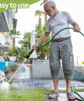 Man using Leak Free Jet Nozzle For Garden Hoses And Power Washer Wand High Pressure Sprayer With Five Nozzles in garden
