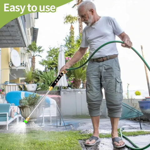 Man using Leak Free Jet Nozzle For Garden Hoses And Power Washer Wand High Pressure Sprayer With Five Nozzles in garden