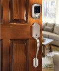 Touchscreen Keypad Deadbolt With Key Fob Access For Exterior Doors installed on a wooden door, Satin Nickel Finish