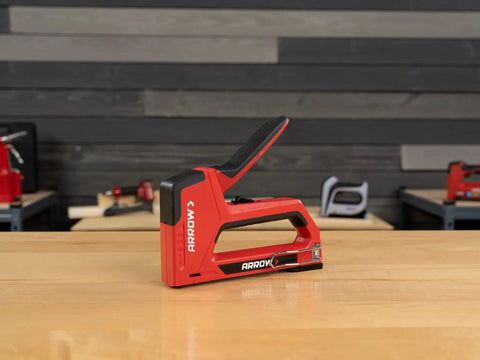 5-In-1 Manual Staple And Nail Gun For Woodworking And Craft Projects Wire Stapler And Brad Nailer In One Handy Tool on table