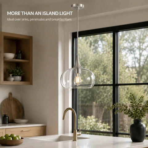 HXXLFONEDP Glass Pendant Light for Kitchen Island, 10 Inch, Brushed Nickel hanging over a kitchen sink with clear glass shade.