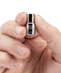 Hand holding a 1/4 Inch Drive Hex Bit Holder Socket with Magnetic Retention showing die-stamped size markings for easy reading.