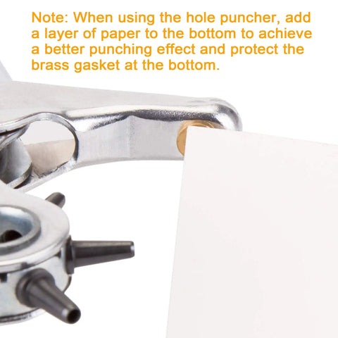 Close-up of Pro Grade Leather Hole Punch Set for Belts Watch Bands Straps demonstrating punching technique with paper layer.