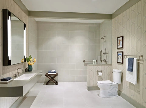 ADA compliant bathroom with 24 Inch Grab Bar With Concealed Mounting In Venetian Bronze Stainless Steel near toilet and shower