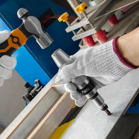 Industrial-Grade 14-Piece Impact Screwdriver Set With 40CR Alloy Steel Bits in use on metal surface, worker holding tool