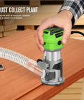 Slick Quick Release 6.5 Amp Compact Wood Router With Fixed Base Offering Dead Accurate Variable Speed Settings 12000 To 30000 Rpm And Hassle Free Bit Changes Flawless Performance For Weekend Diy Warriors in use with dust collection attached.