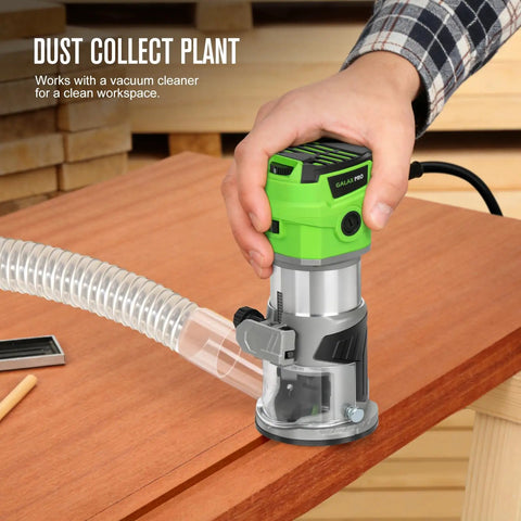 Slick Quick Release 6.5 Amp Compact Wood Router With Fixed Base Offering Dead Accurate Variable Speed Settings 12000 To 30000 Rpm And Hassle Free Bit Changes Flawless Performance For Weekend Diy Warriors in use with dust collection attached.