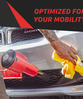 Person using Portable Car Dryer Air Blower With Two Nozzles For Fast Touchless Drying And Cleaning on car grille.