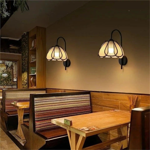 Nordic Floral Petal Wall Sconce Fabric Shade Wall Light,Warmth illuminating cozy restaurant booth with warm, soft light.