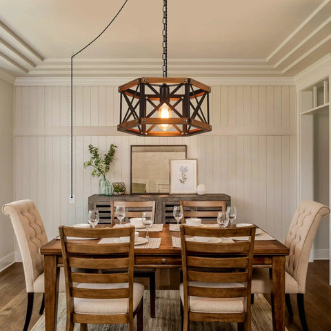 Kickass 14 Inch Black Farmhouse Pendant Light With Plug In Dimmable Switch And Adjustable Woven Cord For Kitchen Island Or Dining Room overhead above dining table with rustic oak wood and metal cage.
