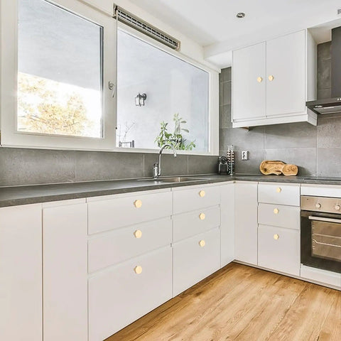 Modern kitchen with Two Pack Matte Gold Bifold Closet Door Knobs, Round Cabinet and Drawer Knobs for Wardrobe, Dresser, and Furniture