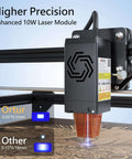 ORTUR laser engraver on a rail, black module with blue laser engraving wood.